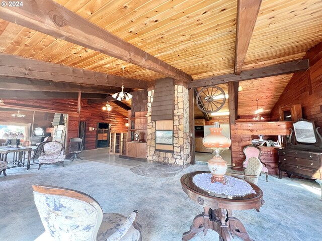 interior space featuring wooden ceiling, wooden walls, and lofted ceiling with beams