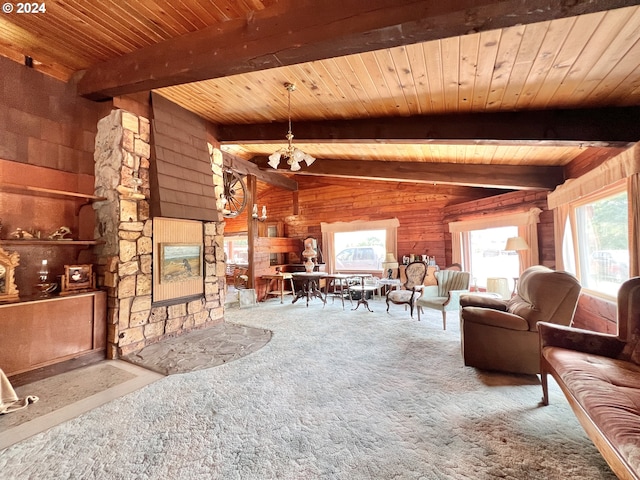 530 Riverside Dr, Burns, OR 97720 - living room with wood walls, wooden ceiling, carpet floors, and a chandelier
