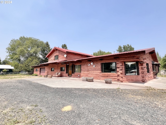 view of log-style house