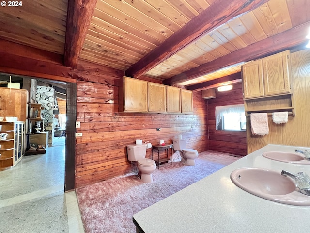 530 Riverside Dr, Burns, OR 97720 - full bath with toilet, wood ceiling with exposed beams, wooden walls, and double vanity