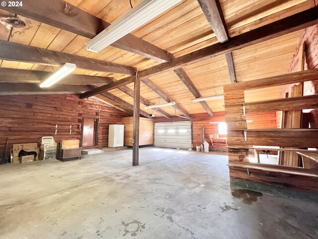 530 Riverside Dr, Burns, OR 97720 - garage featuring wood walls and wooden ceiling