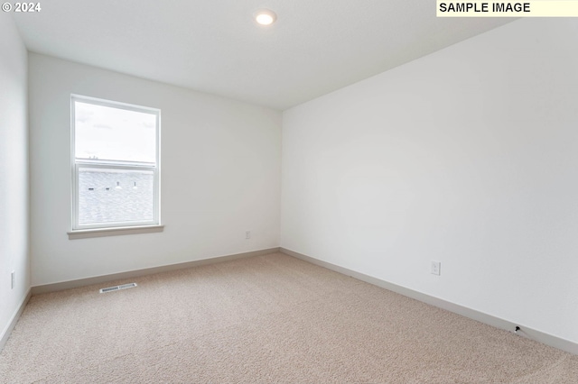 empty room featuring carpet