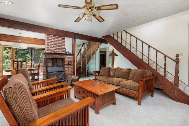 carpeted living room featuring a wood stove, a textured ceiling, ceiling fan, and beam ceiling