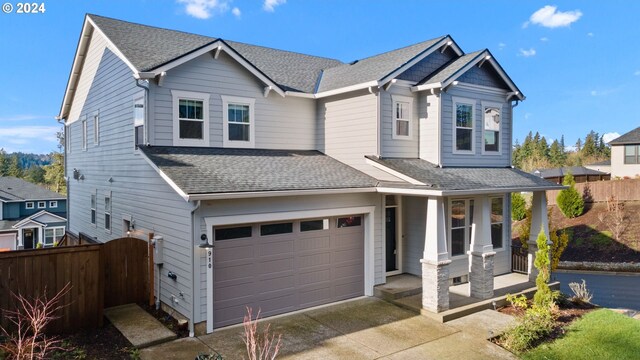 craftsman-style home with a garage