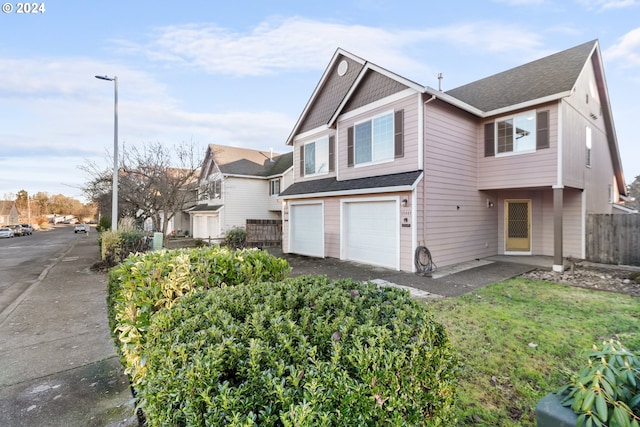 view of front of property featuring a garage