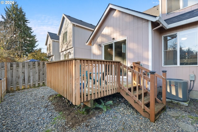 exterior space featuring central AC and a deck