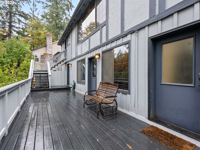 wooden terrace featuring stairway