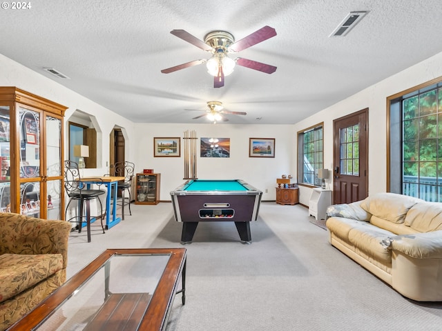 game room with light carpet, arched walkways, billiards, and visible vents