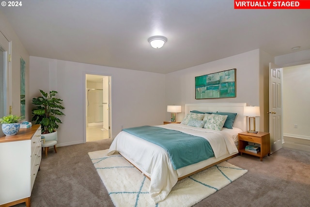 bedroom with light carpet, connected bathroom, and baseboards