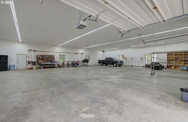 parking deck featuring a garage door opener