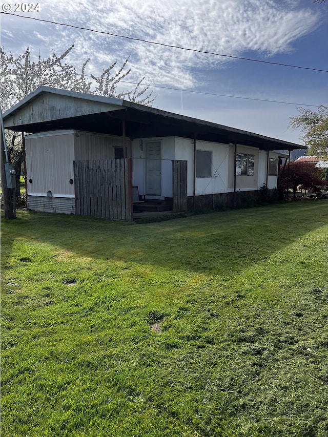 exterior space featuring a yard