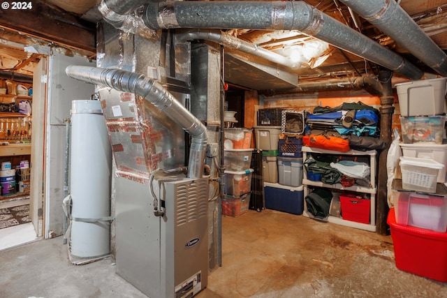 utility room featuring gas water heater