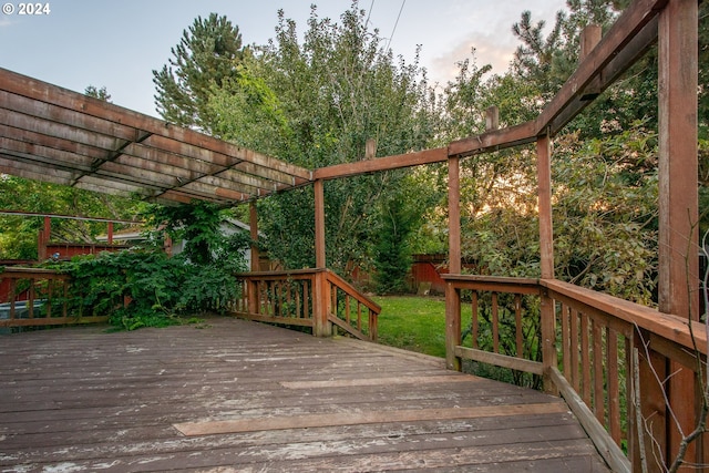 wooden deck featuring a pergola