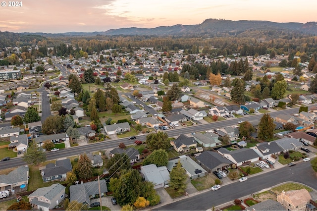 aerial view at dusk with a mountain view