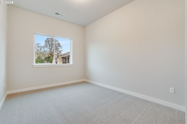 empty room featuring carpet