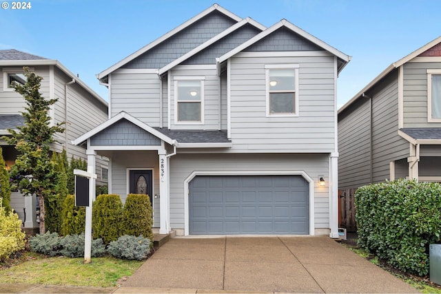 craftsman house with a garage