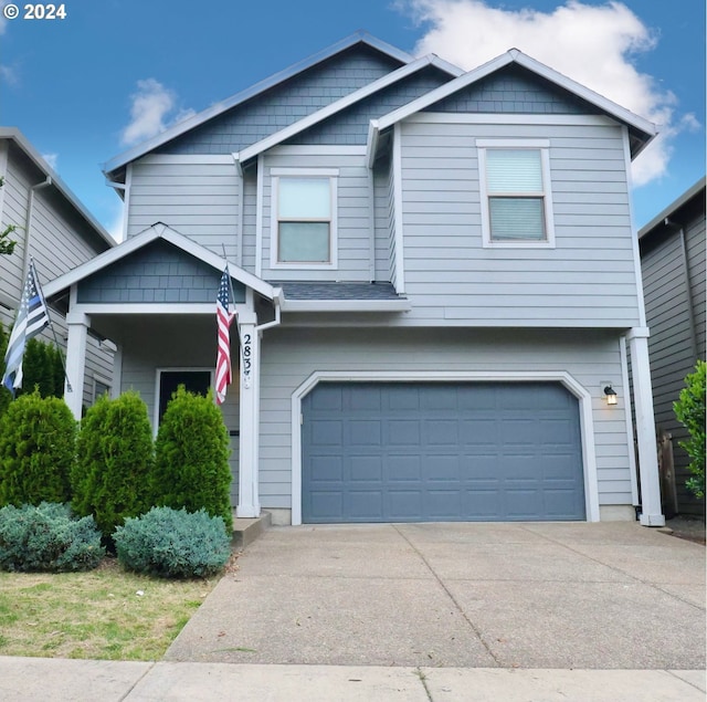 view of front of property featuring a garage