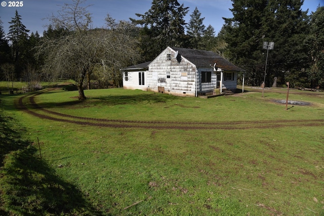 view of yard with entry steps
