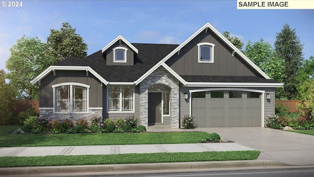 craftsman-style house featuring a garage and a front yard