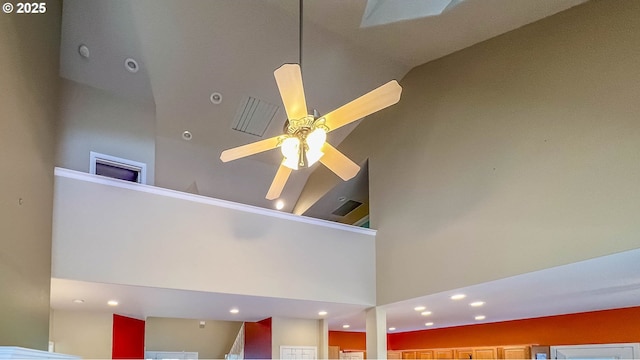 interior details with a ceiling fan and recessed lighting