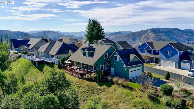 birds eye view of property featuring a residential view and a mountain view