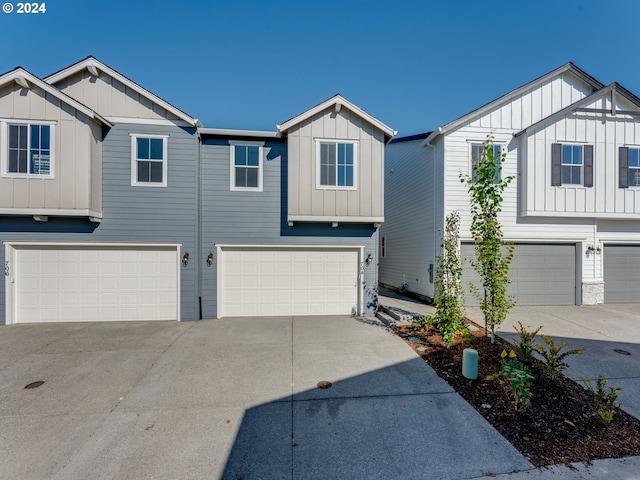 multi unit property featuring a garage