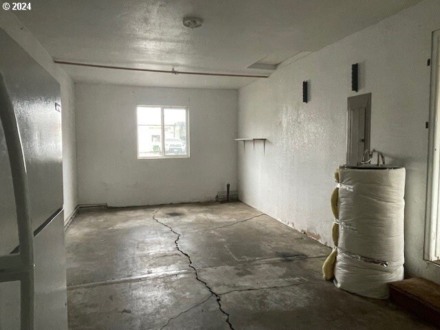 170 NE Exchange Ave, Roseburg, OR 97470 - basement featuring electric panel and heating unit