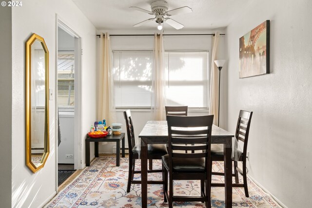 dining space featuring ceiling fan