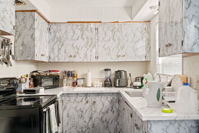 kitchen with black appliances