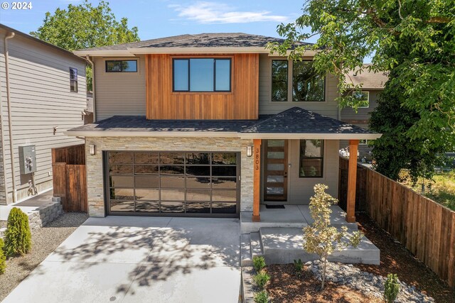 view of front of property with a garage