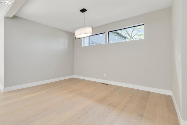 unfurnished dining area featuring hardwood / wood-style flooring