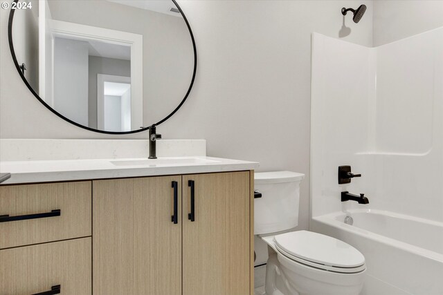 full bathroom with vanity, toilet, and tub / shower combination