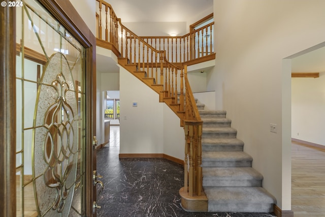 foyer entrance with dark hardwood / wood-style flooring