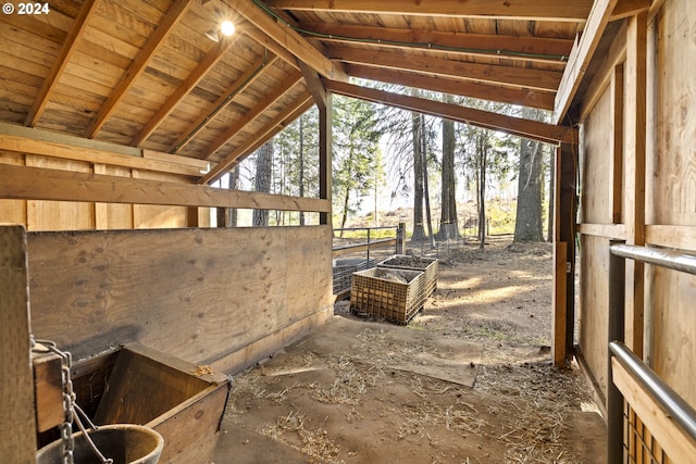 misc room featuring vaulted ceiling with beams and a healthy amount of sunlight