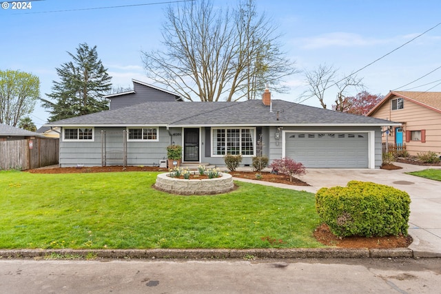 ranch-style home with a front lawn and a garage