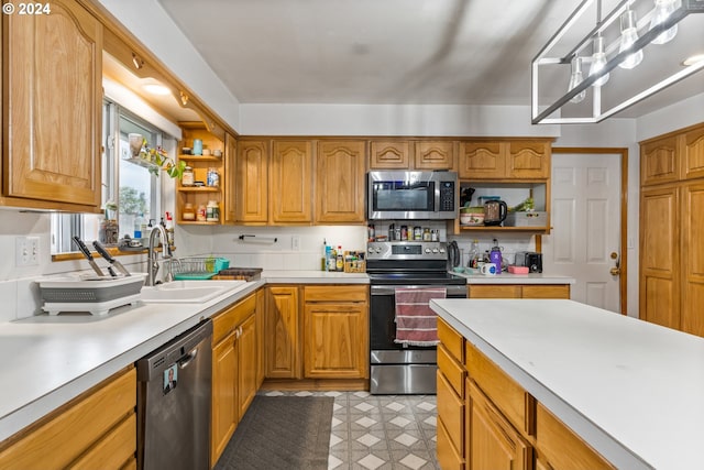 kitchen with stainless steel appliances and sink