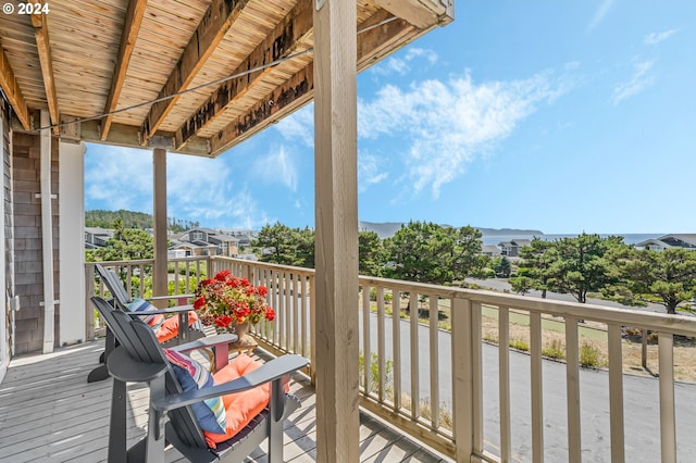 wooden balcony with a wooden deck