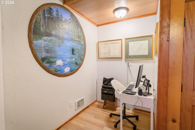 office space with light hardwood / wood-style floors, wood ceiling, and crown molding