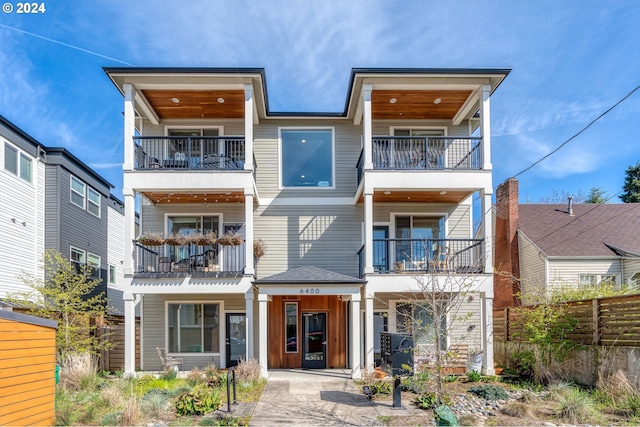 contemporary house featuring a balcony