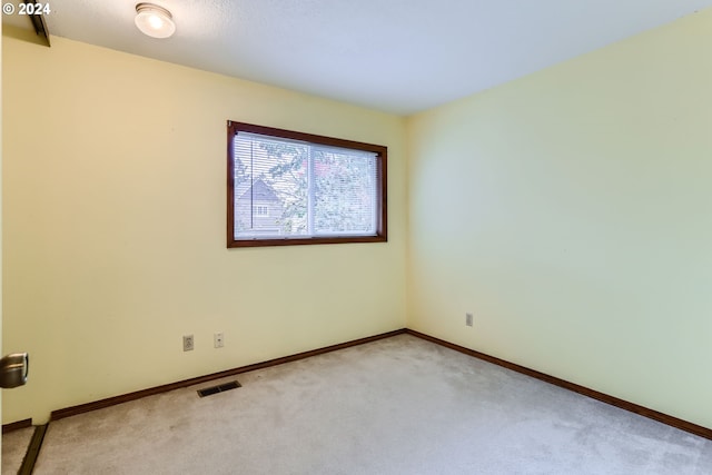 empty room with light carpet