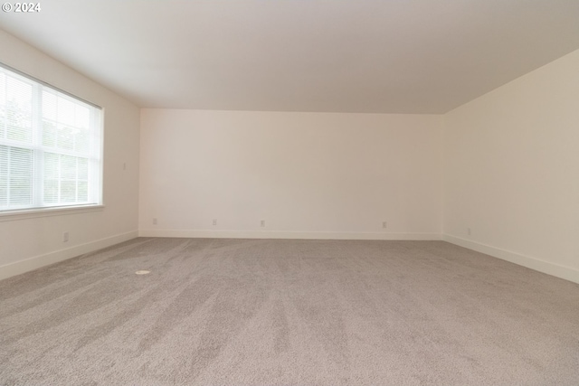 9 Waterford Downs, Florence, OR 97439 - unfurnished room featuring baseboards and light colored carpet