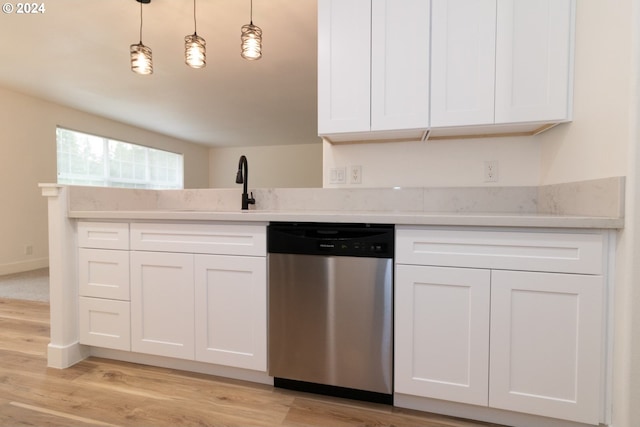 9 Waterford Downs, Florence, OR 97439 - kitchen with light wood finished floors, dishwasher, and white cabinetry