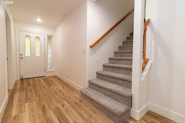 9 Waterford Downs, Florence, OR 97439 - foyer featuring recessed lighting, stairway, light wood-type flooring, and baseboards