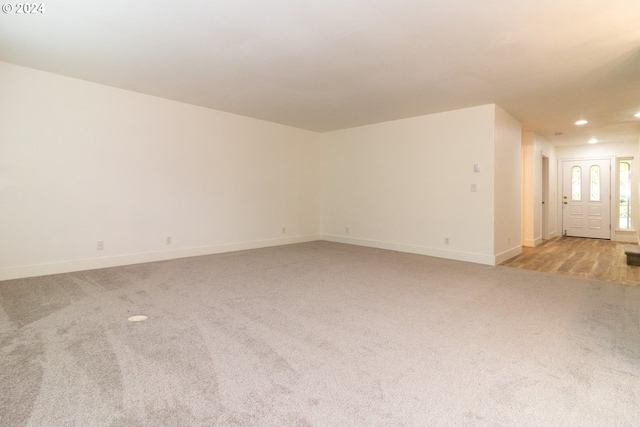 9 Waterford Downs, Florence, OR 97439 - empty room featuring baseboards, recessed lighting, and light carpet