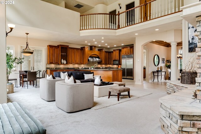 carpeted bedroom featuring high vaulted ceiling, french doors, and access to exterior