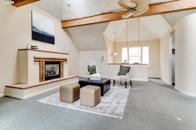 kitchen with tile countertops, hanging light fixtures, and carpet floors