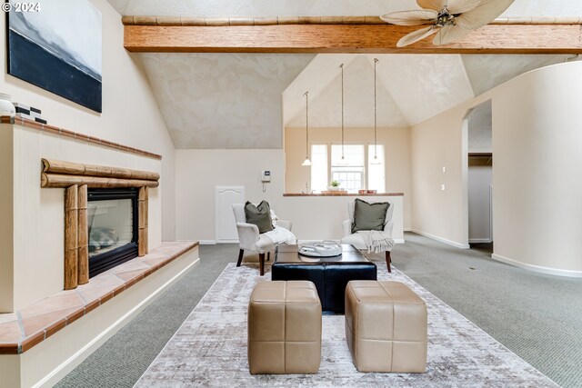 kitchen featuring decorative light fixtures, beamed ceiling, french doors, carpet floors, and fridge