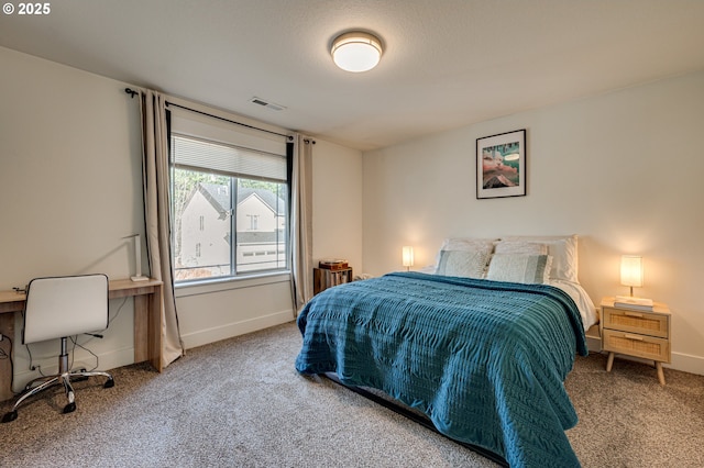 bedroom featuring carpet