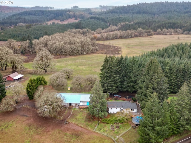 birds eye view of property featuring a rural view