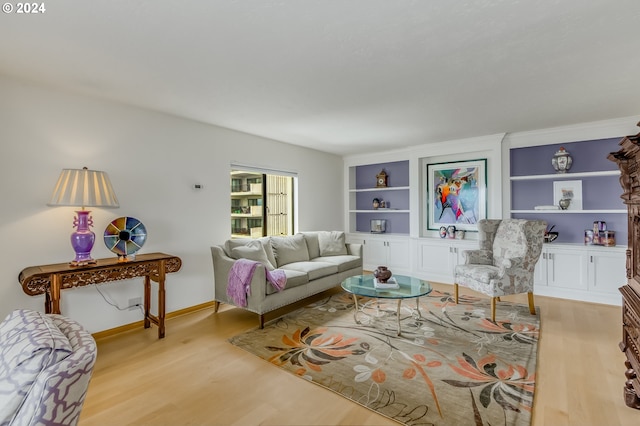 living room with light hardwood / wood-style flooring